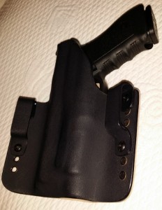 Designed for my Glock 31 with light. Notice the additional holes for raising or lowering the holster to my specific needs
